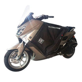 Coprigambe Termoscud R180X, un coprigambe impermeabile con fodera termica. In uso su scooter. Di Tucano Urbano.